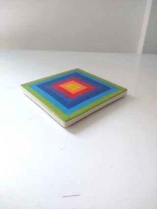 Wonderfully cheerful Hand painted rainbow stripe coasters. Part of the Rainbow Ceramics tableware